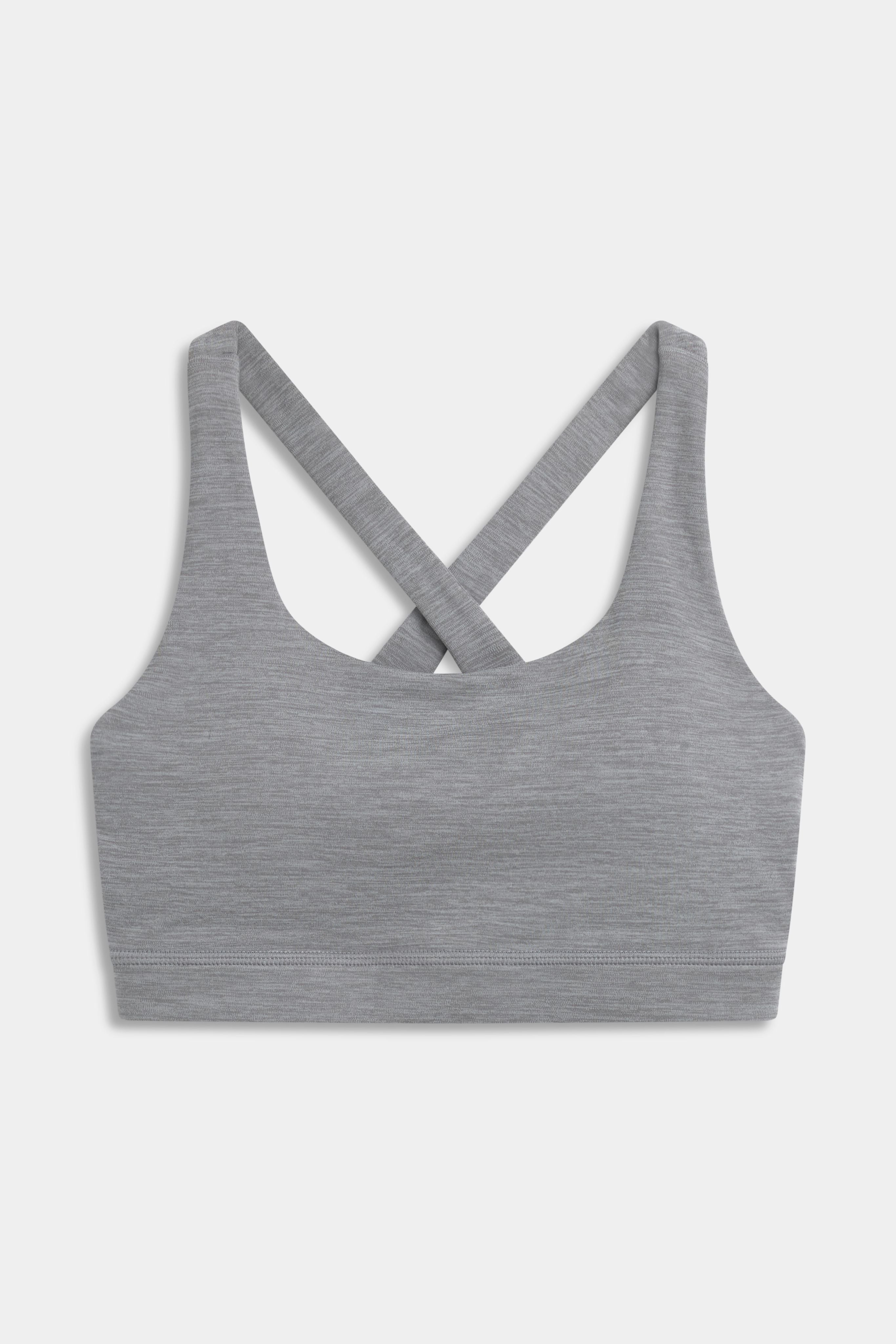 Front view of the CASPARA Cloudform crossback sports bra in grey melange.