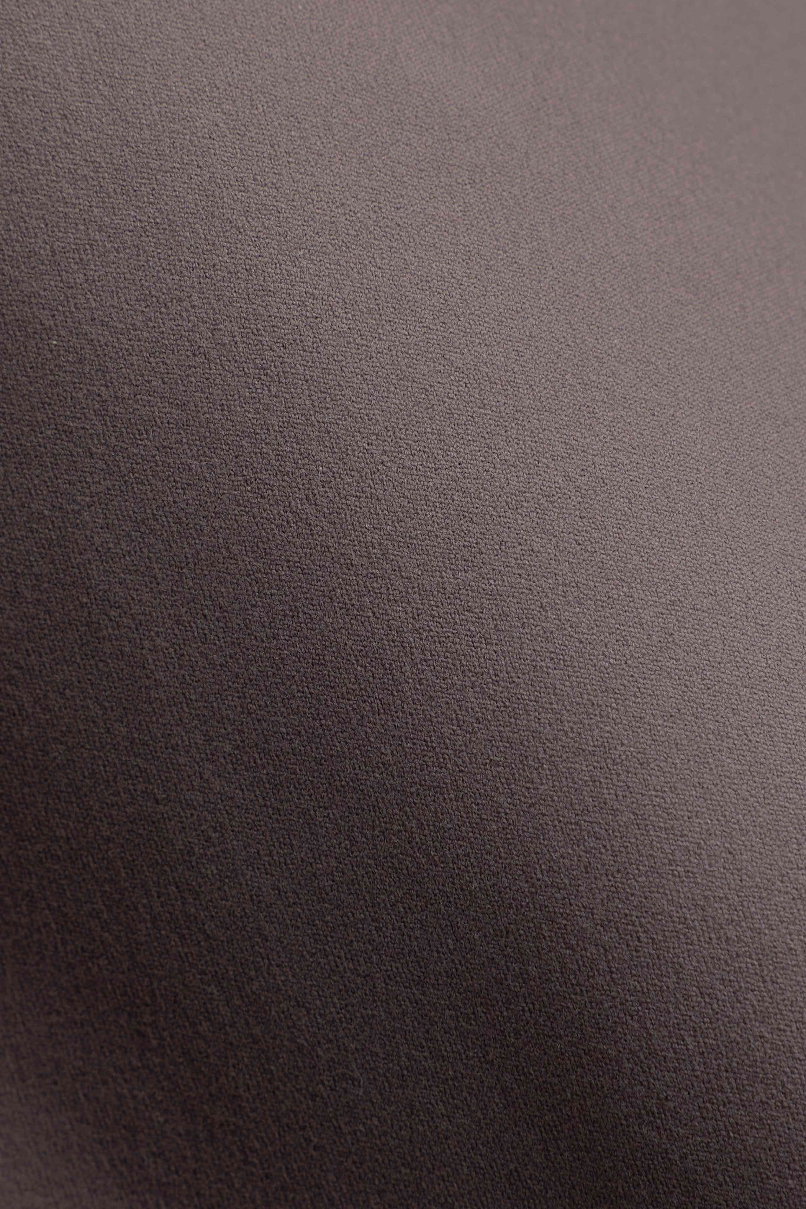 Close-up of the soft brushed matte texture of the walnut Cloudform fabric.