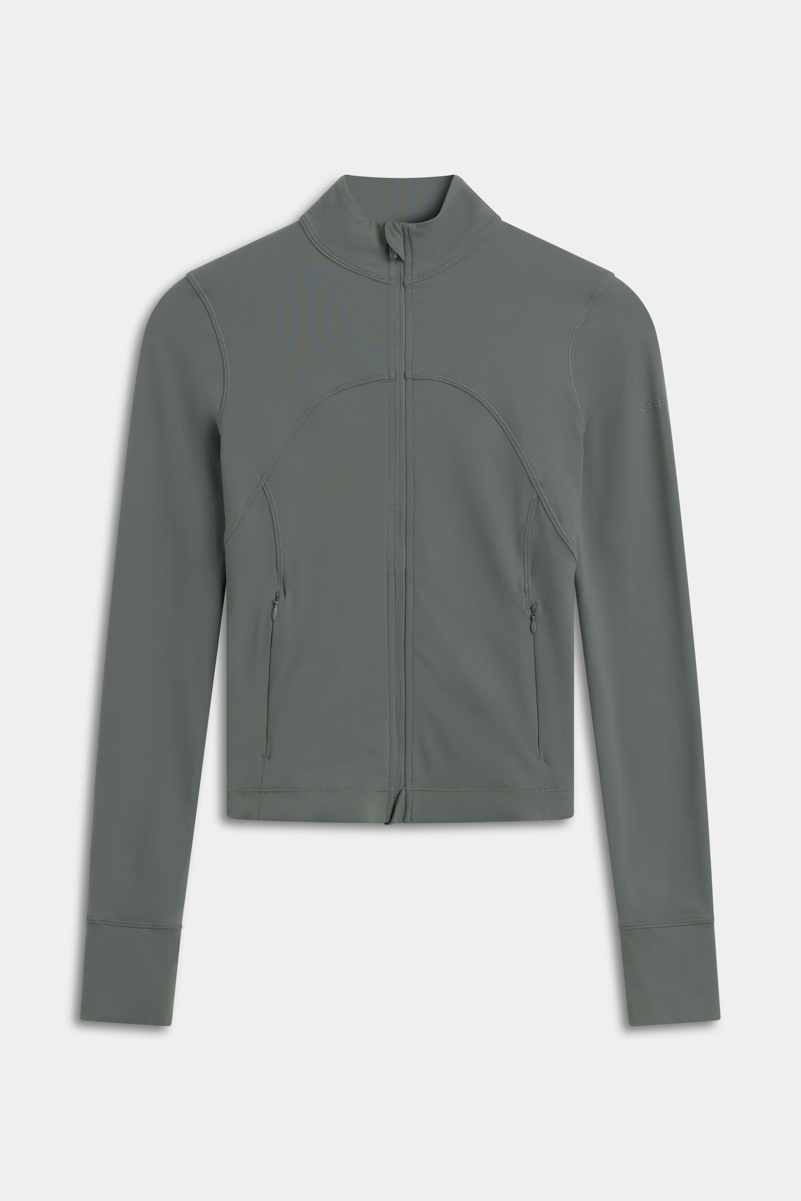Front view of the khaki CASPARA Sculptluxe zip jacket with contoured seams and a full-length zipper.