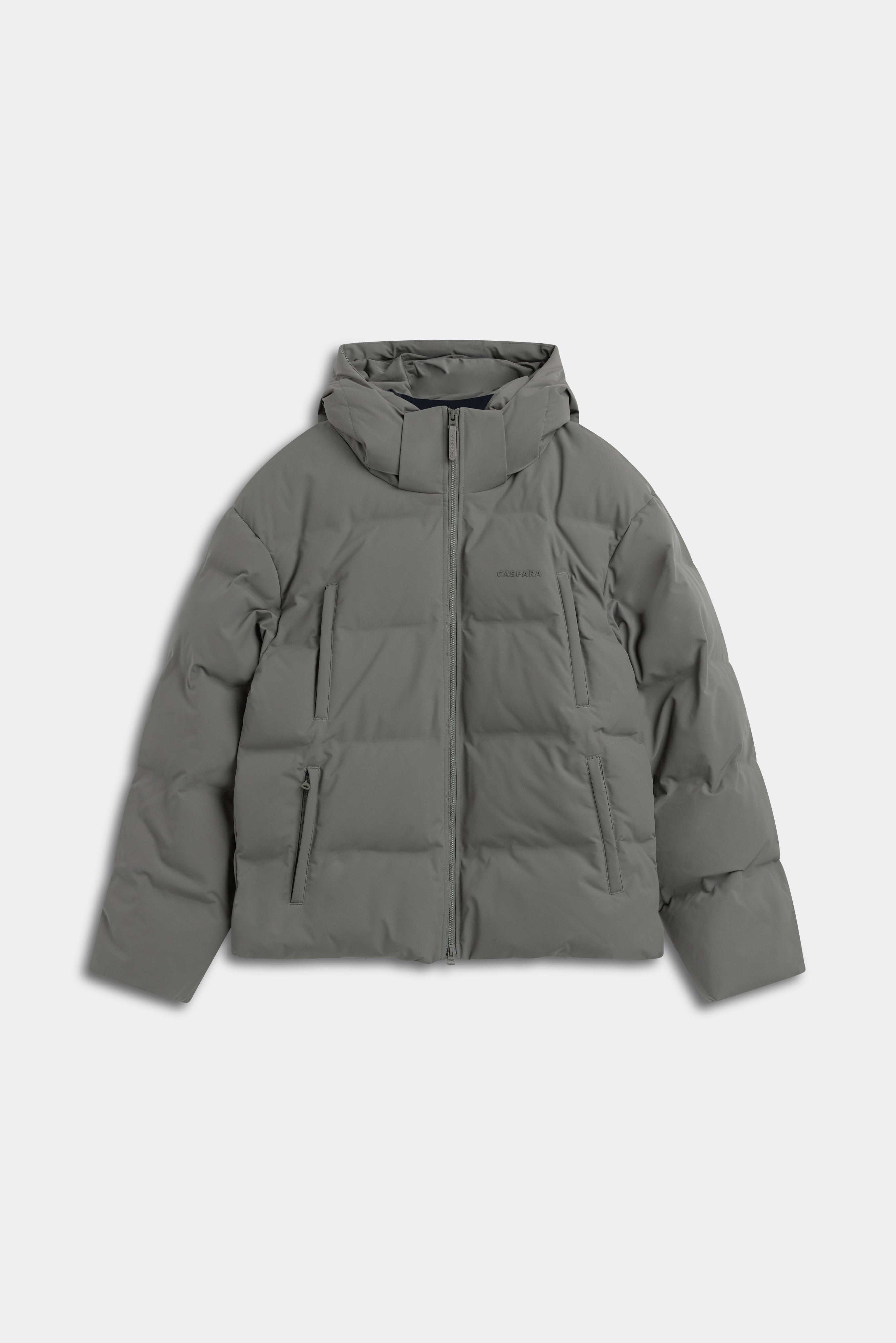 Front view of the men's khaki CASPARA Boreal puffer jacket with a hood.
