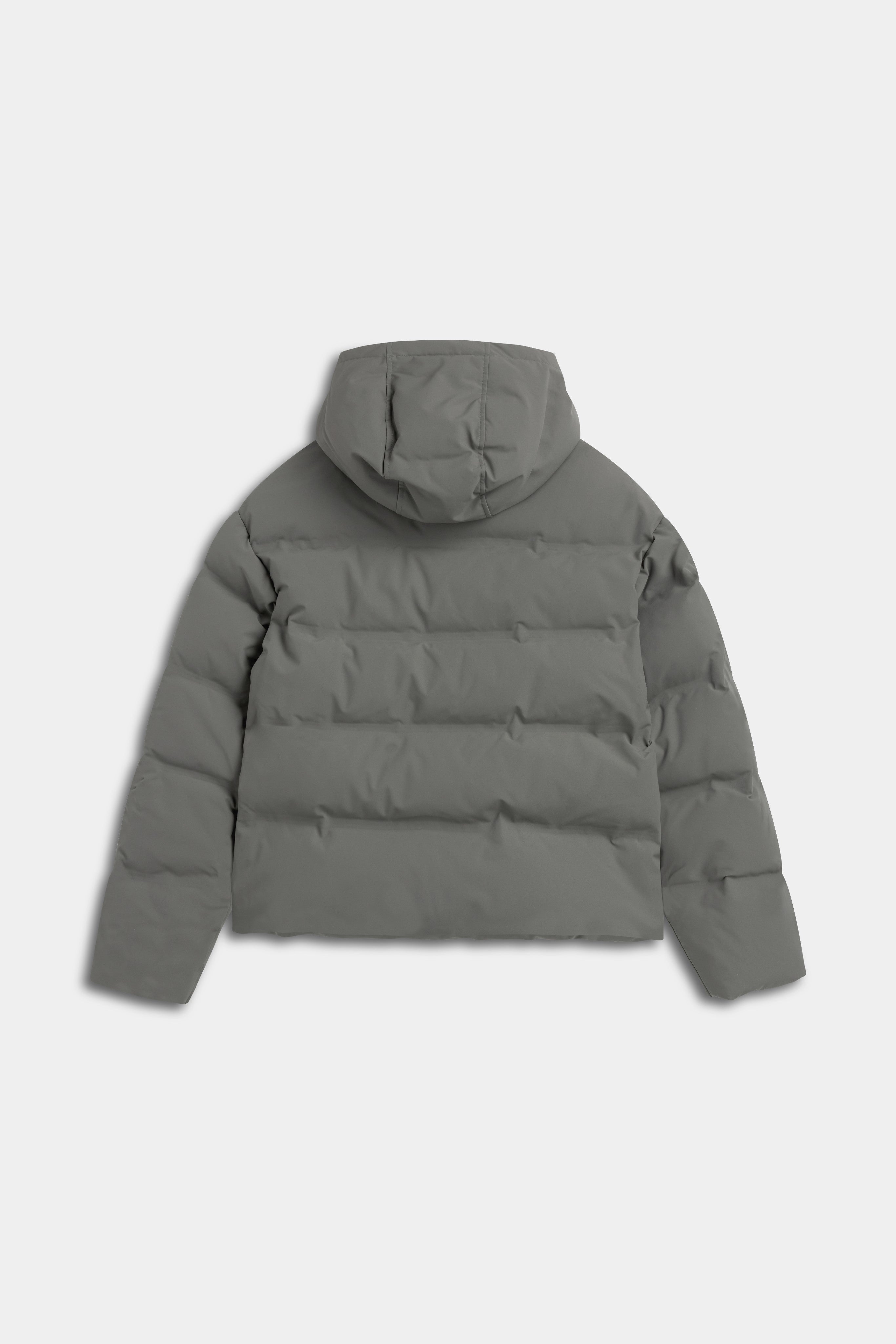 Back view of the khaki CASPARA Aurora puffer jacket with an attached hood.