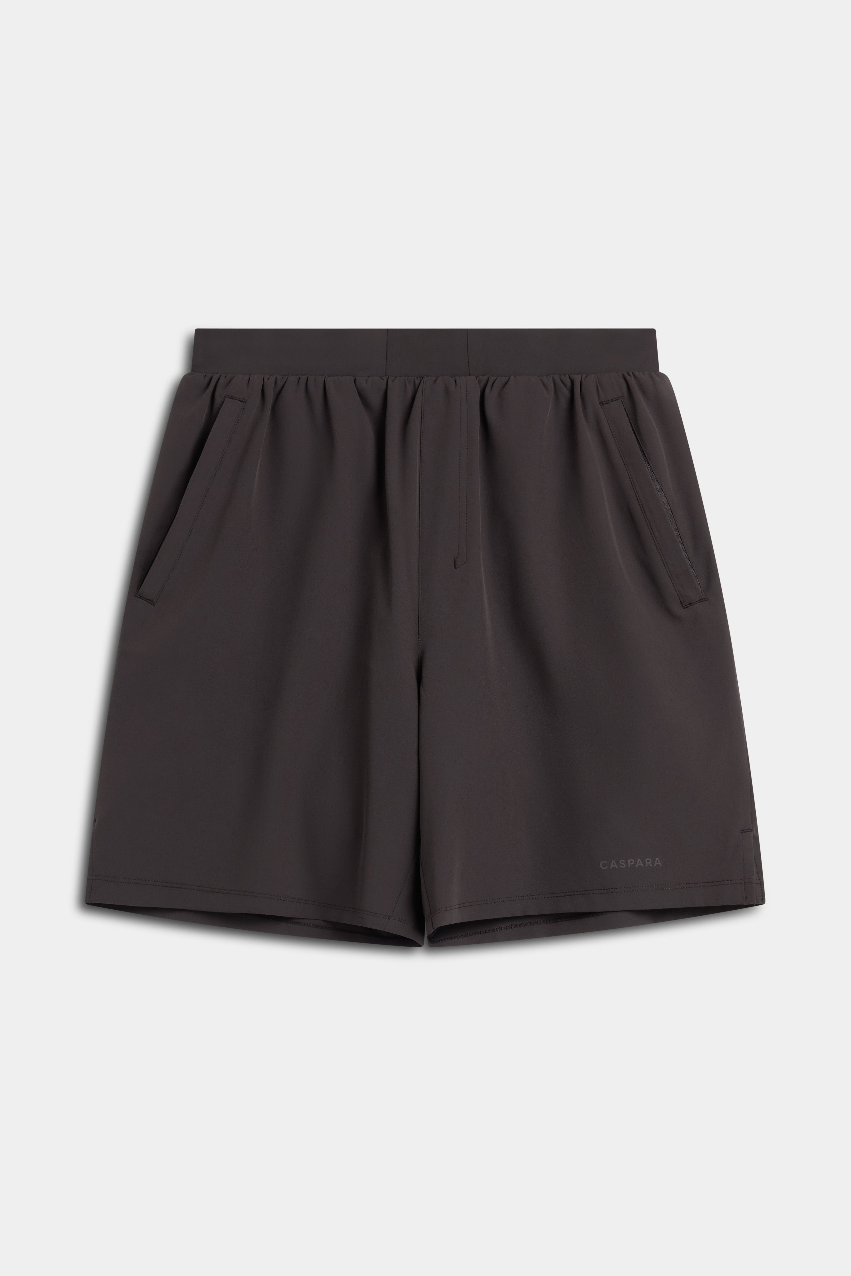 Front view of men's CASPARA Vantage 2-in-1 shorts in espresso brown.