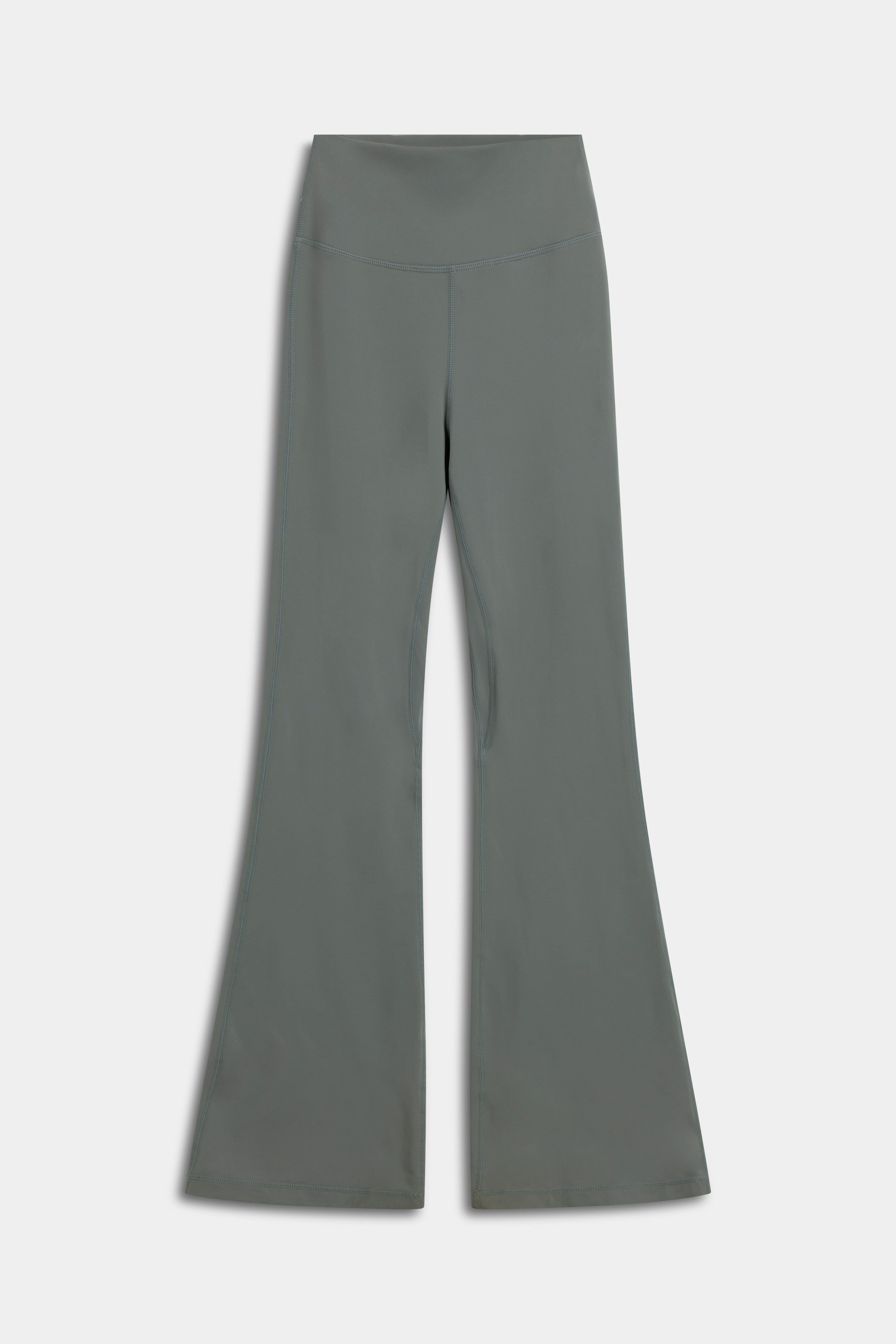 Front view of the khaki CASPARA Cloudform® flared yoga pants on a light background.