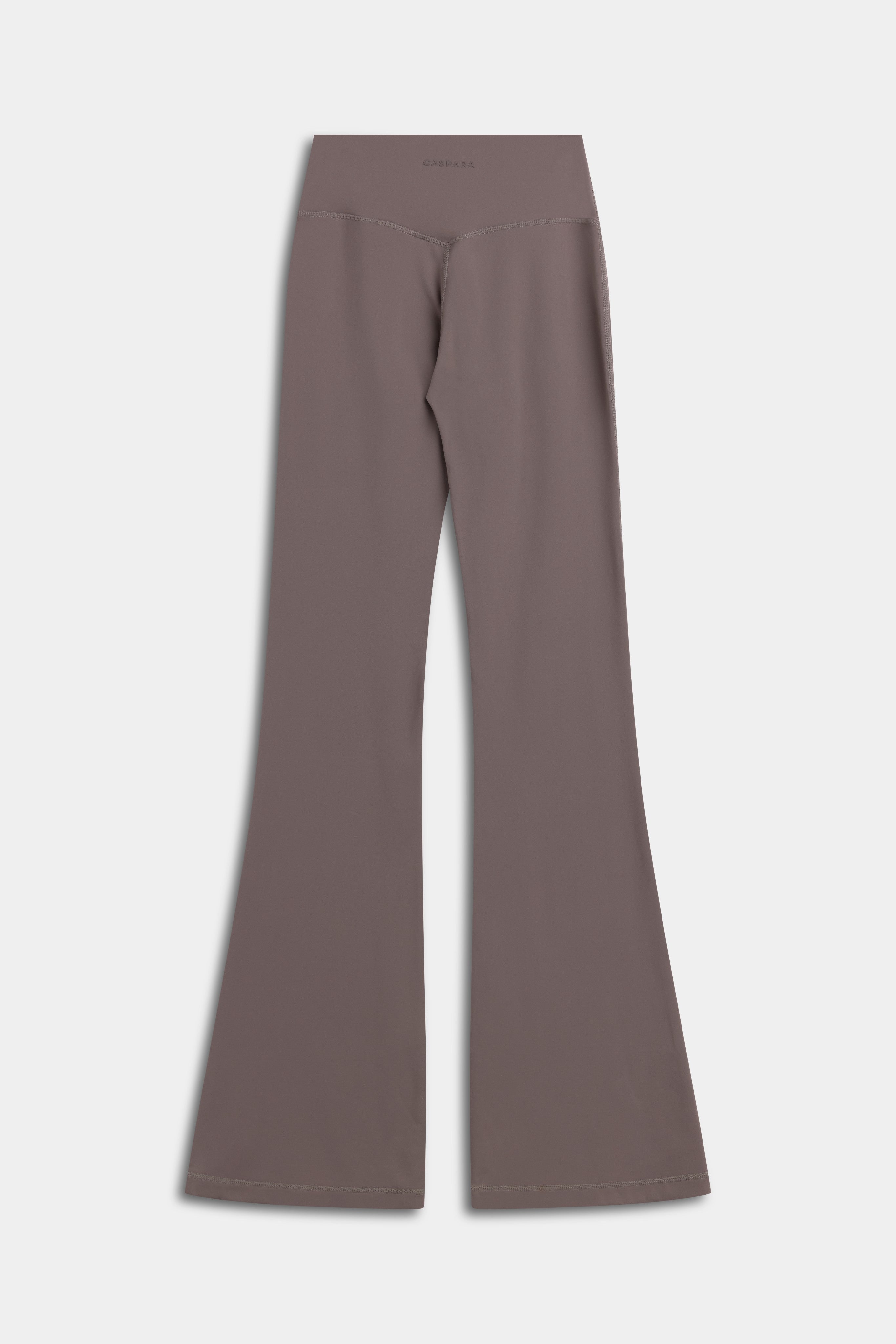 Back view of CASPARA Cloudform flared yoga pants in walnut.