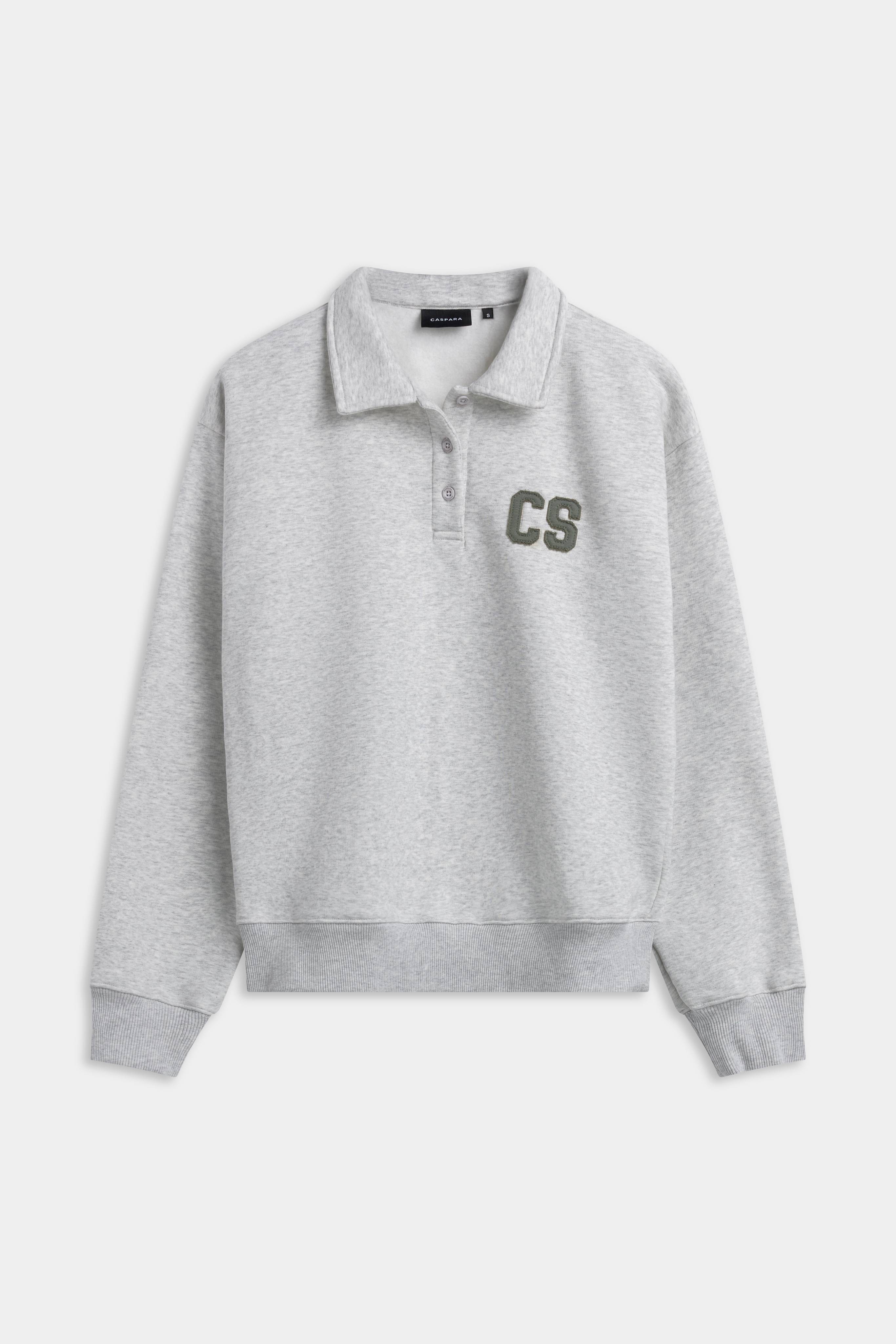 Grey melange CASPARA CS rugby shirt with a buttoned polo collar and khaki chest logo.