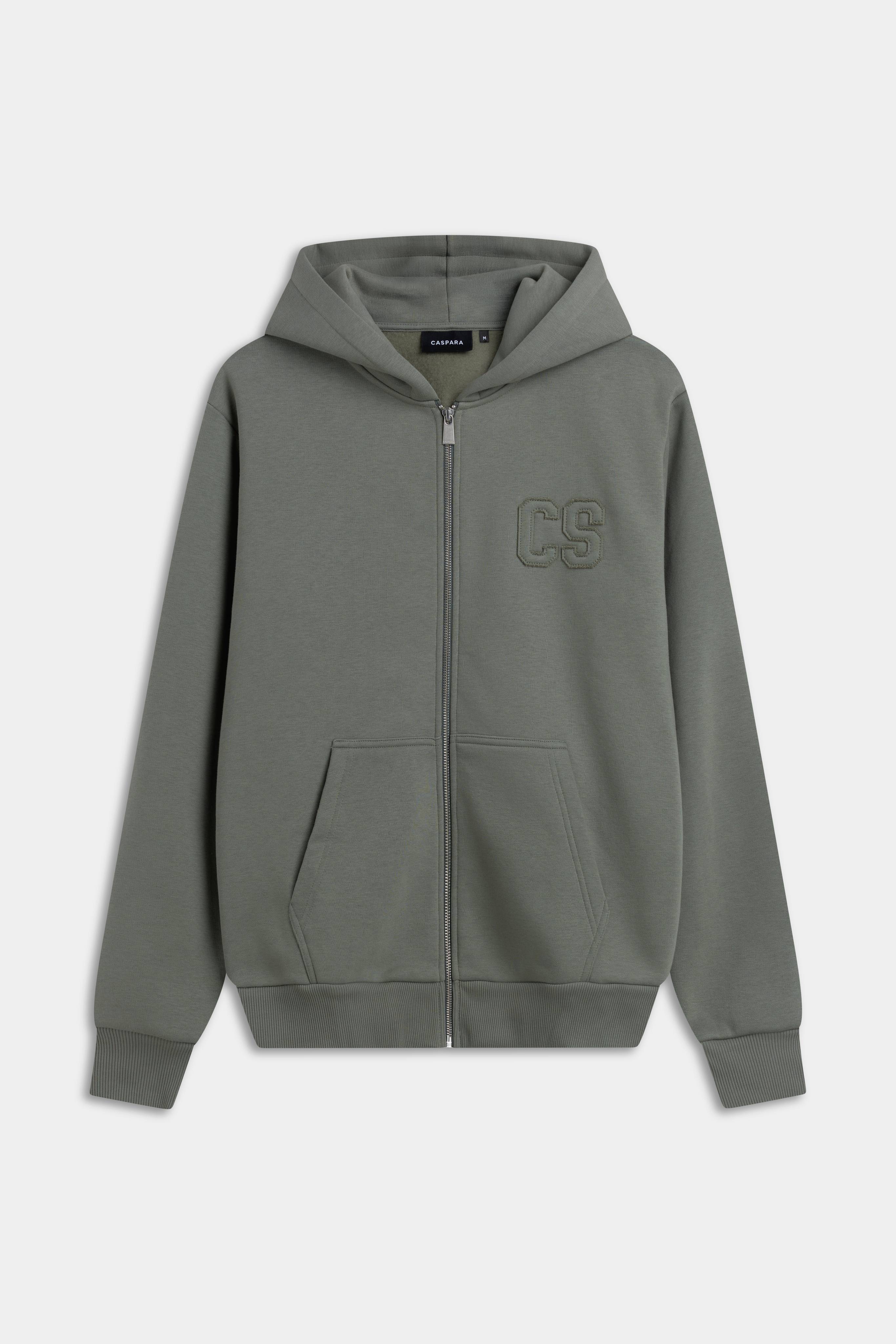 Khaki CASPARA CS zip hoodie with a silver front zipper and tonal embroidered logo on the chest.