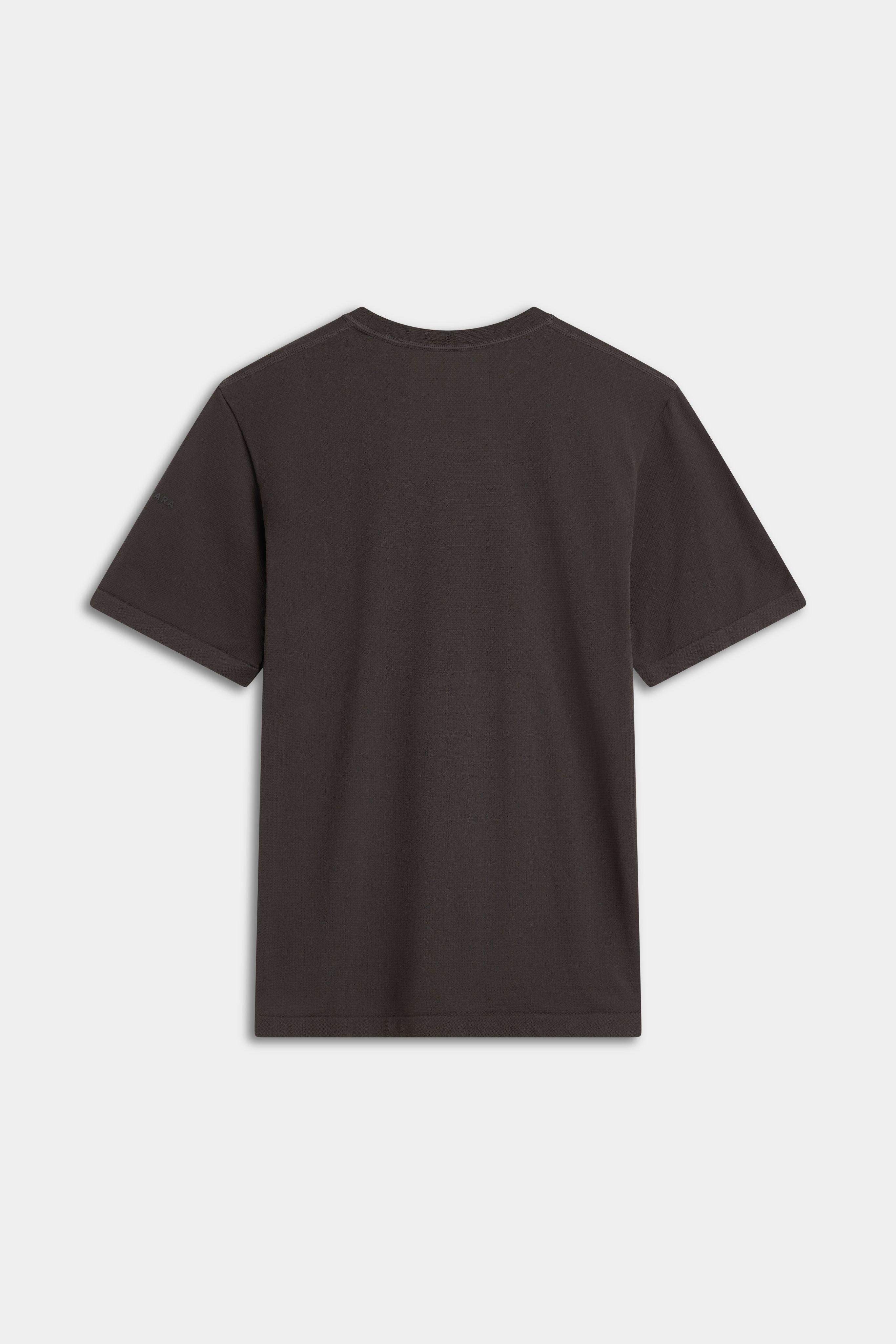 Back view of the CASPARA Seamlite tee in espresso brown on a light background.