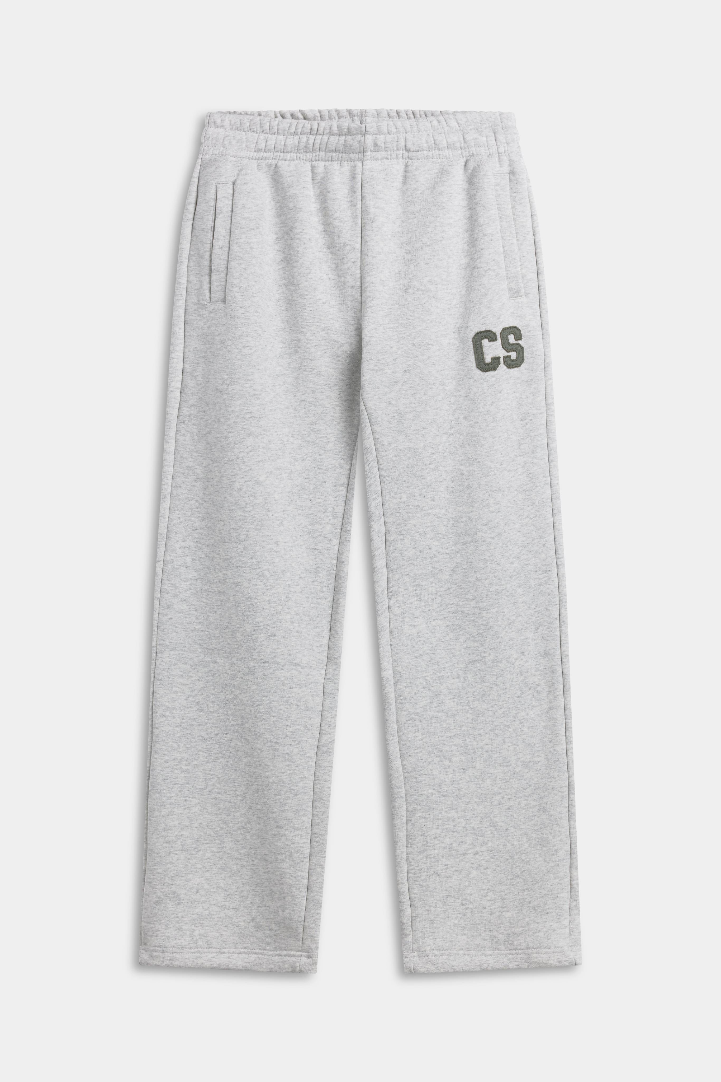 Grey melange CASPARA straight-leg sweatpants with a khaki CS logo patch on the thigh.