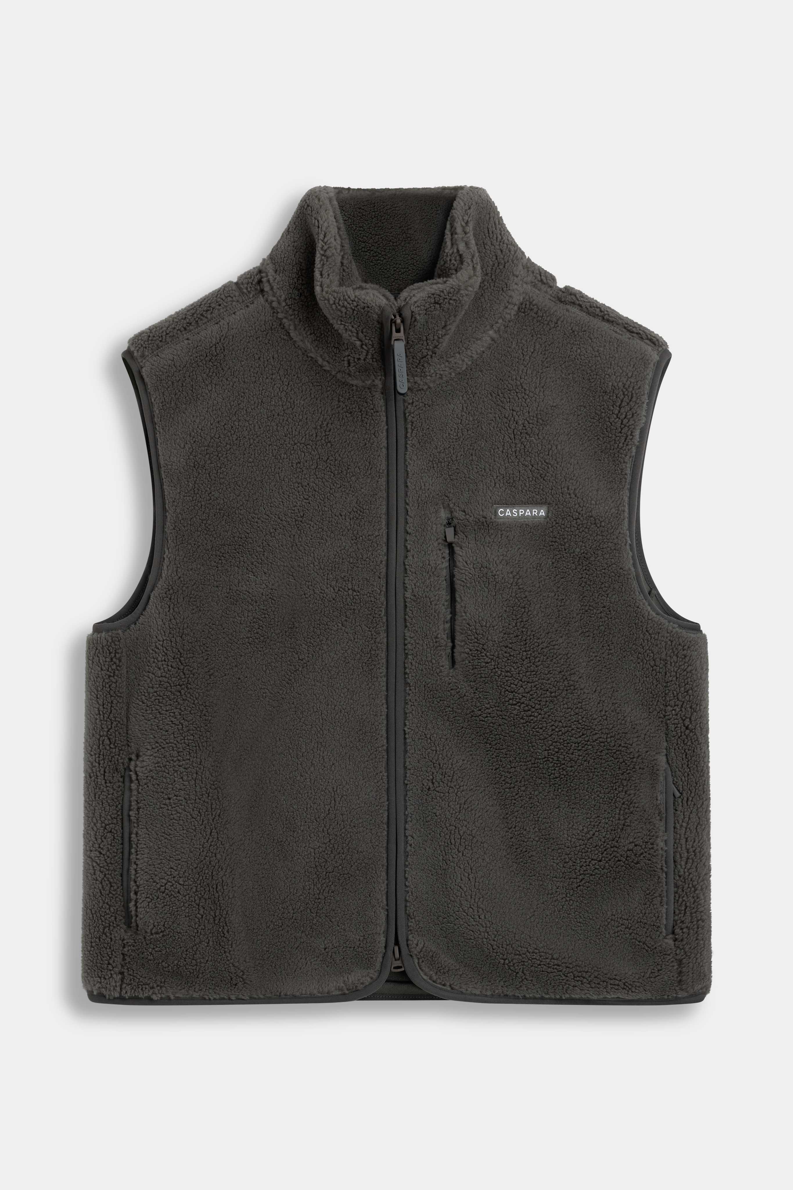 Khaki CASPARA Cloudfleece vest featuring a full-zip front, high collar, and zipped chest pocket.