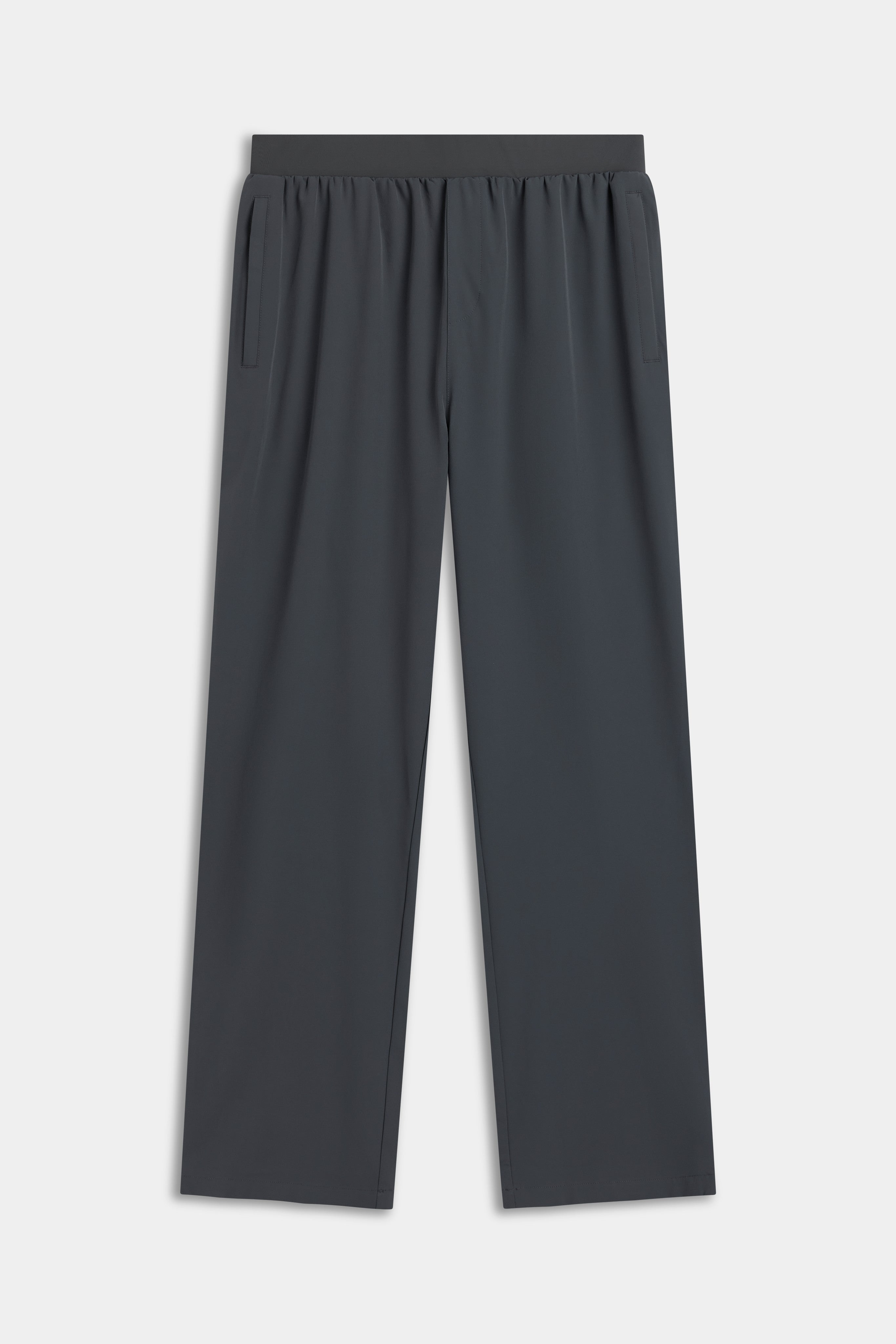 Front view of CASPARA Prime Core Pants in olive green laid flat.