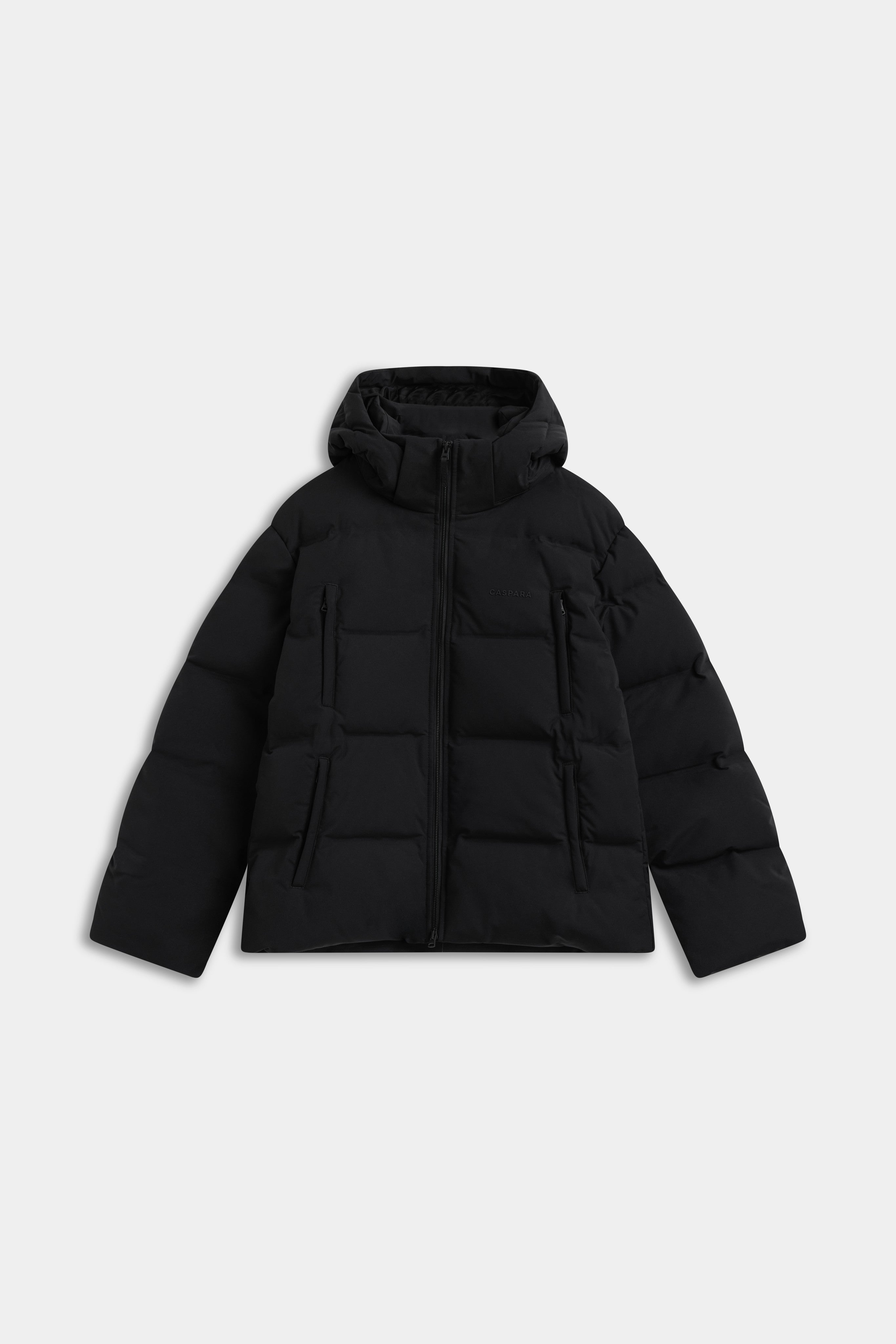 CASPARA men's Boreal puffer jacket in black with hood and front zip pockets.