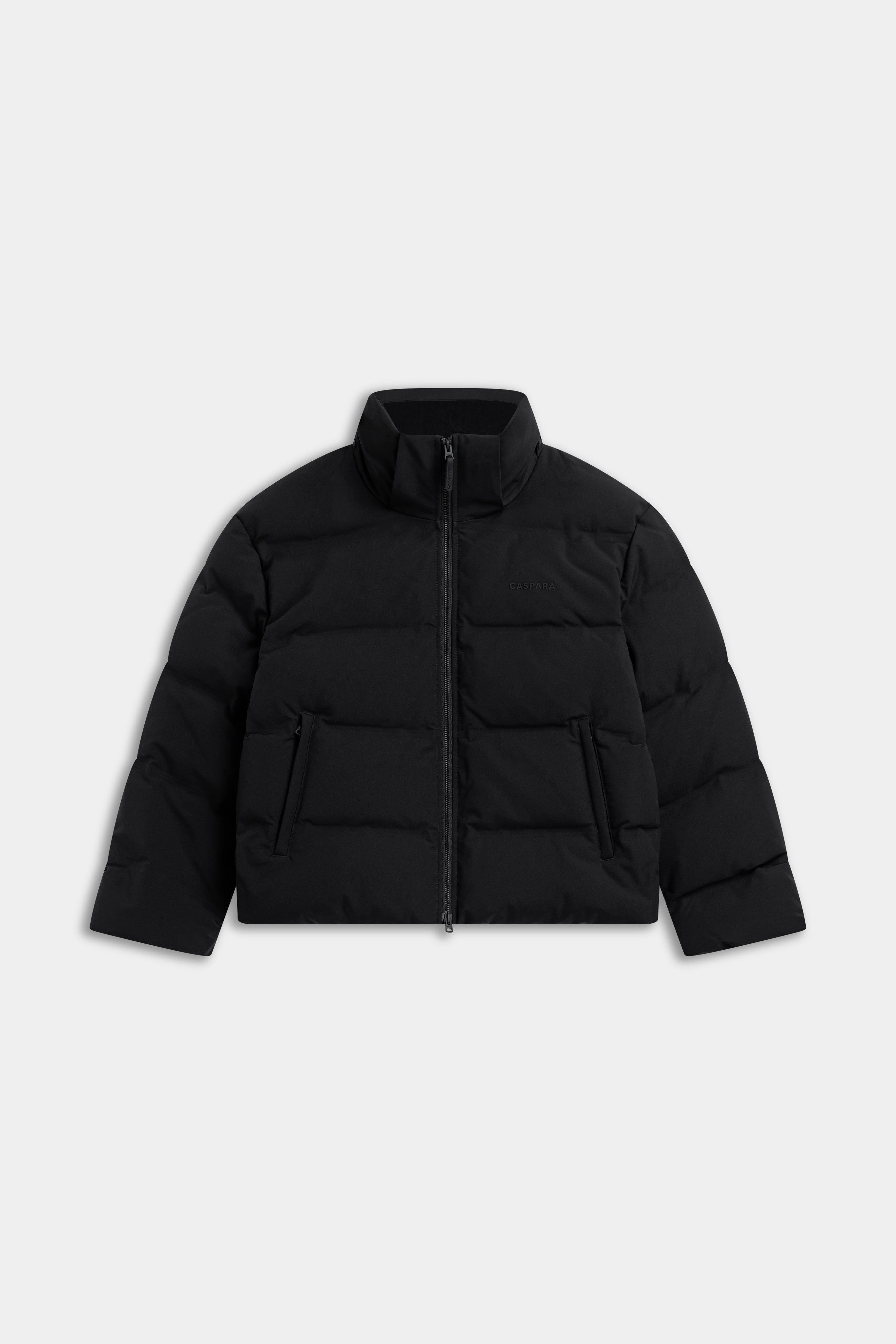 Front view of the black CASPARA Aurora puffer jacket with a high stand collar on a plain background.