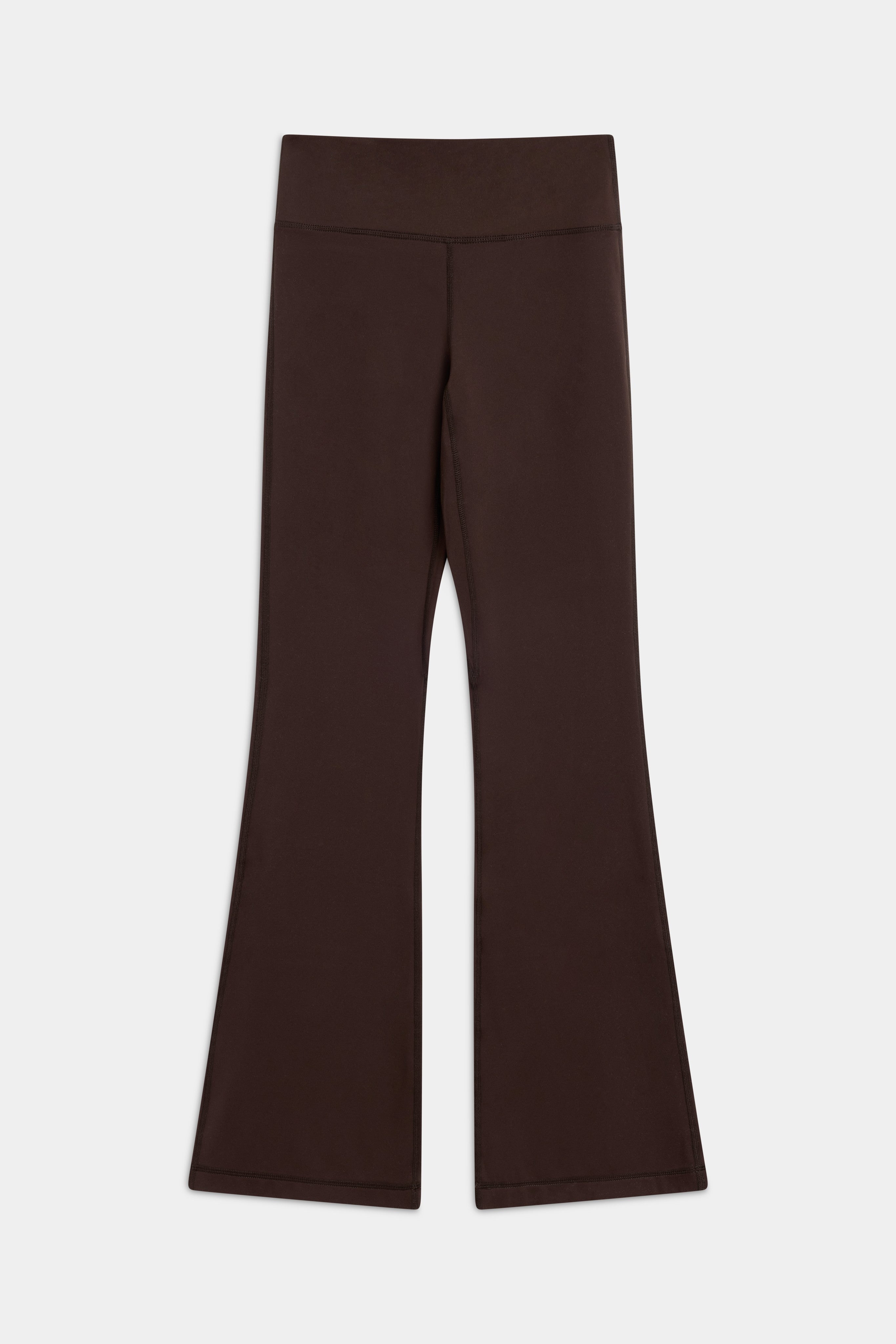 Front view of espresso brown CASPARA Cloudform flared yoga pants on a grey background.