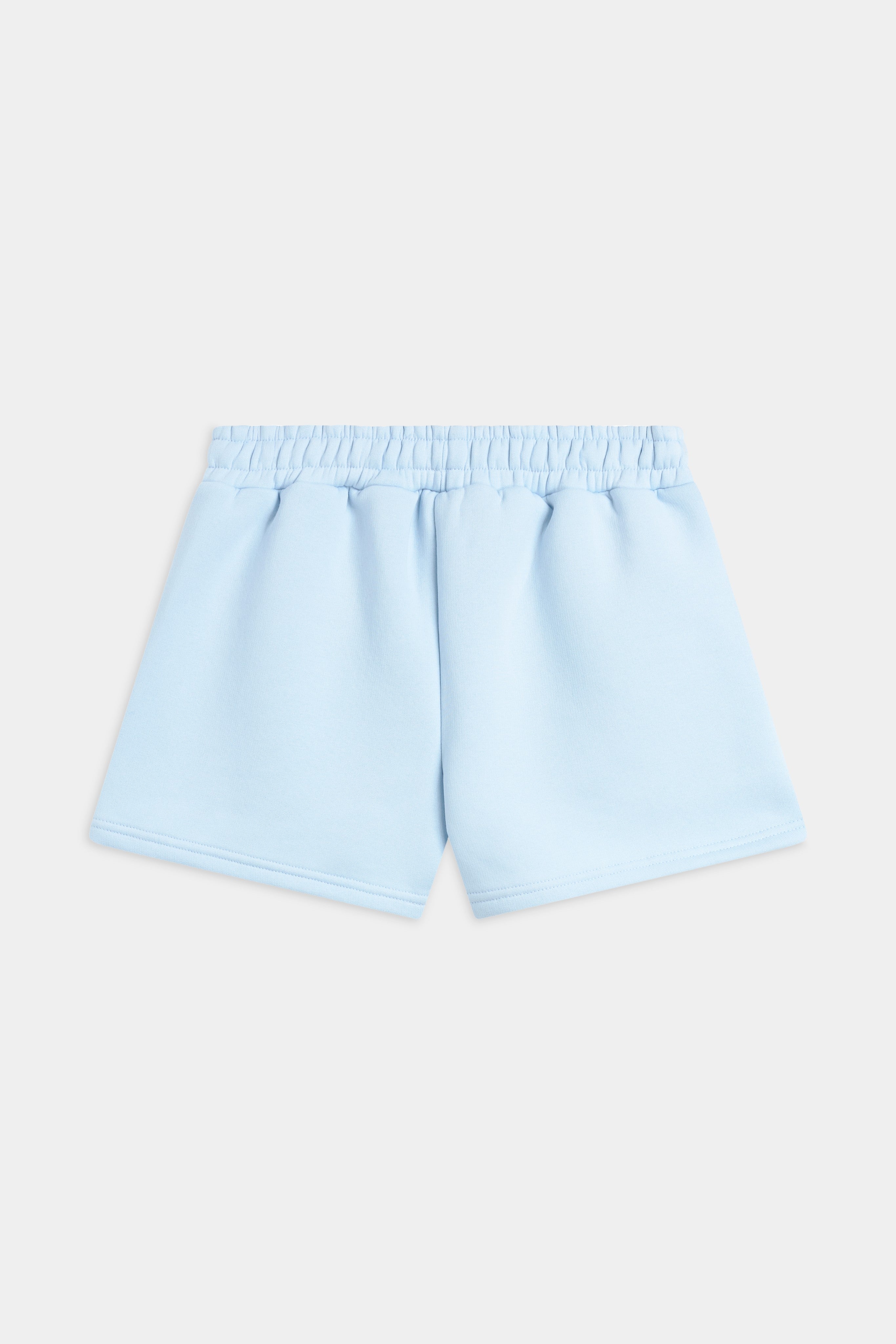 Back view of CASPARA women's Pollux sweat shorts in baby blue.