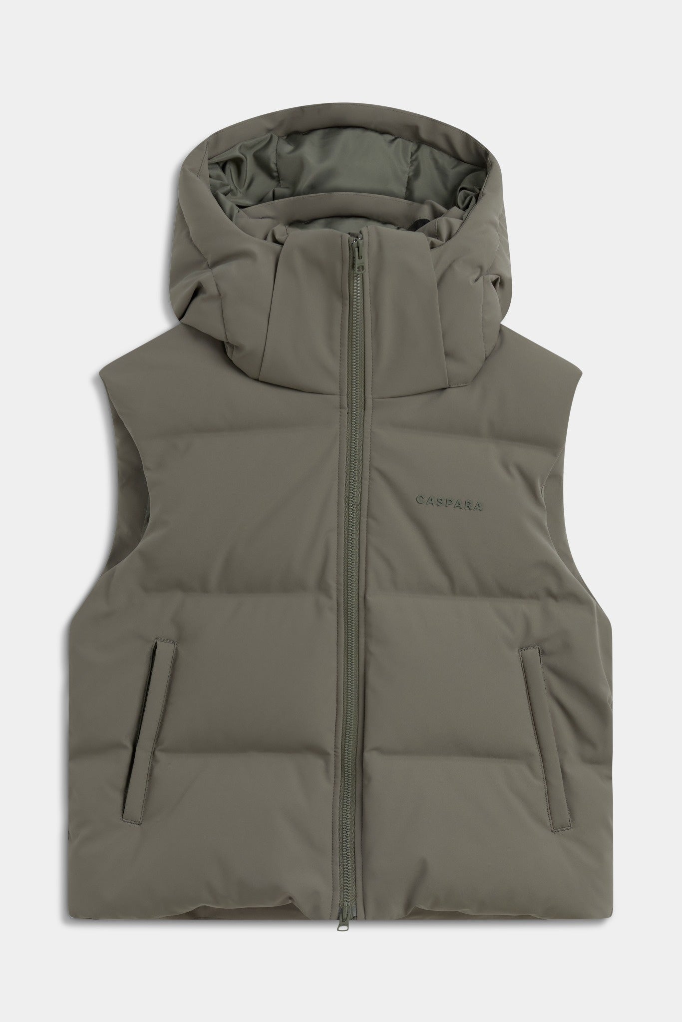 Khaki CASPARA Aurora hooded puffer vest on a light grey background.