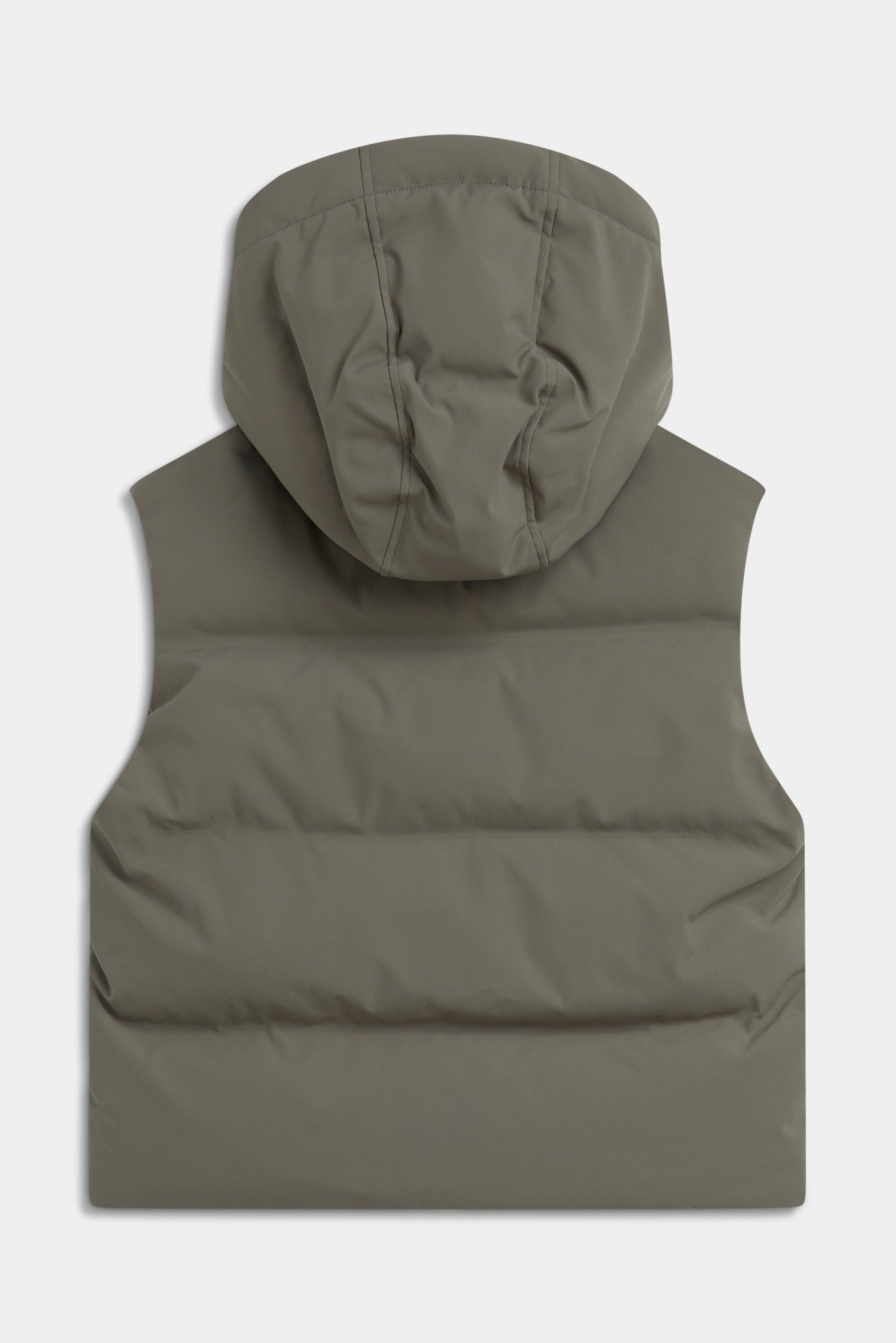 Back view of the khaki CASPARA Aurora hooded puffer vest against a light background.