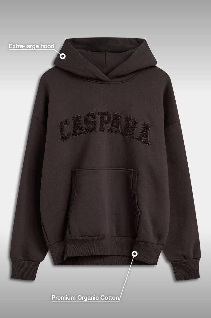 Espresso CASPARA All-Star hoodie highlighting its extra-large hood and premium organic cotton.